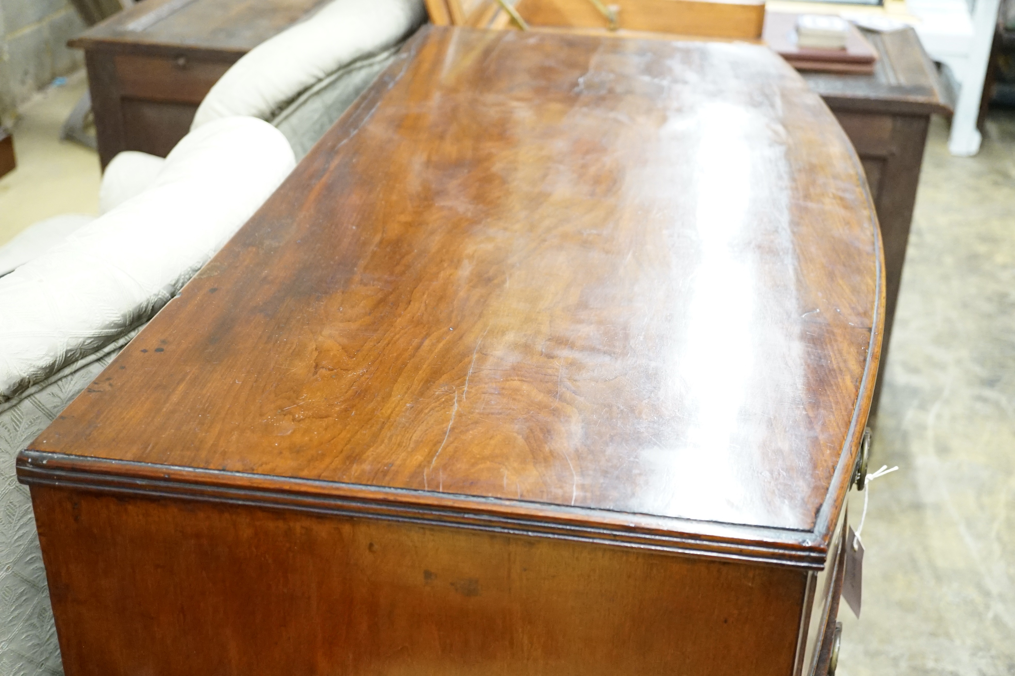 A Regency bow fronted mahogany chest of two short and three long drawers, width 108cm, height 100cm